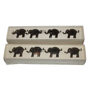 set of 8 Pier One nickel plated elephant napkin rings trunks up (2 boxes of 4)